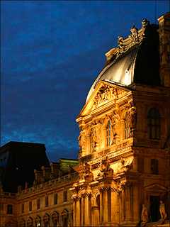 Louvre Museum at dusk (image courtesy of Gloumouth1 via Wikipedia)